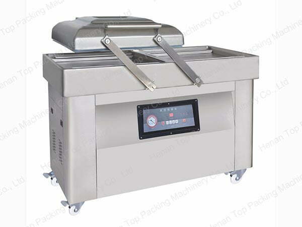 Double chamber vacuum packing machine