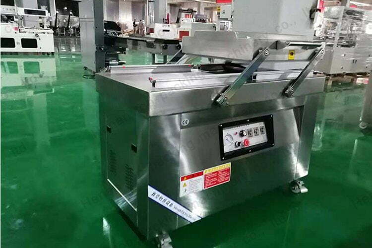 Double vacuum chamber packer