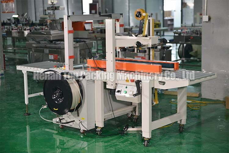 The carton sealing & strapping machine in factory