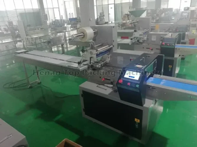 Pillow wrapping machine for cookie packing