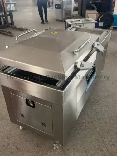 Double chamber vacuum packing machine