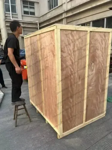 Rotary cup filling and sealing machine in the wooden crate