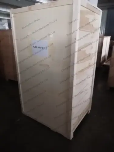 Machine d’emballage de sucettes dans une caisse en bois