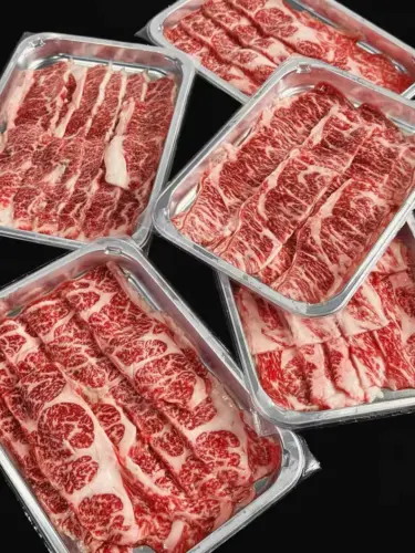 Manual vacuum skin packaging machine for meat